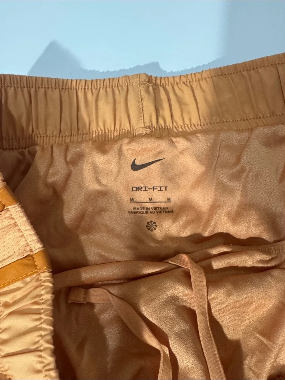 Nike Women’s Light Orange Athletic Running Shorts
